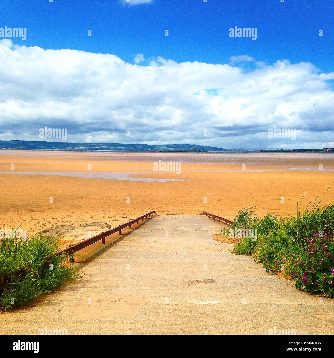 Slipway down to Hoylake Beach by the River Dee Wirral looking over to