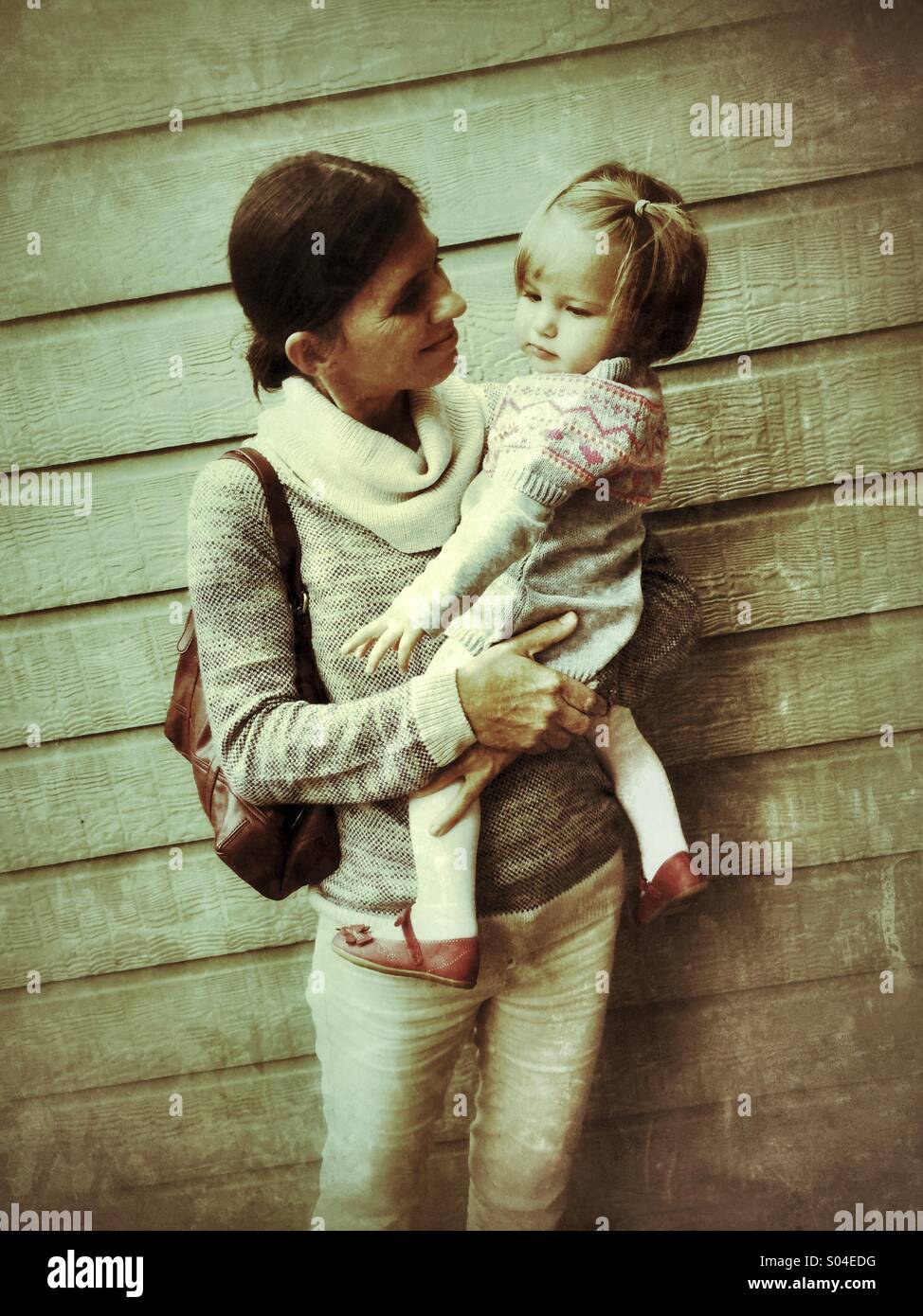 Baby mother standing holding hi-res stock photography and images - Alamy