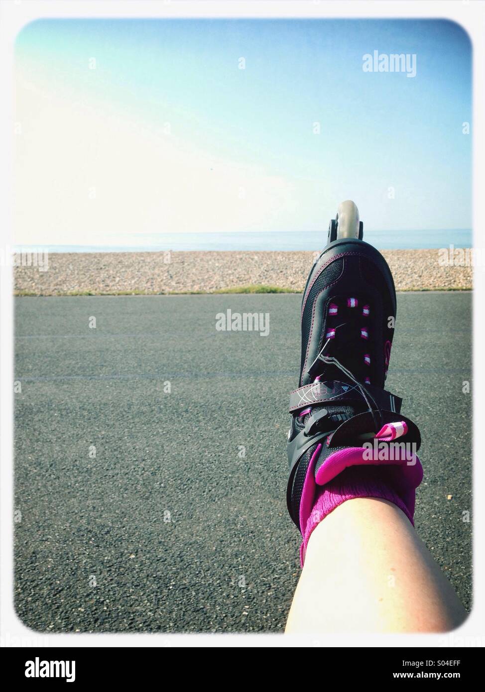 Roller blade foot on sunny day Stock Photo