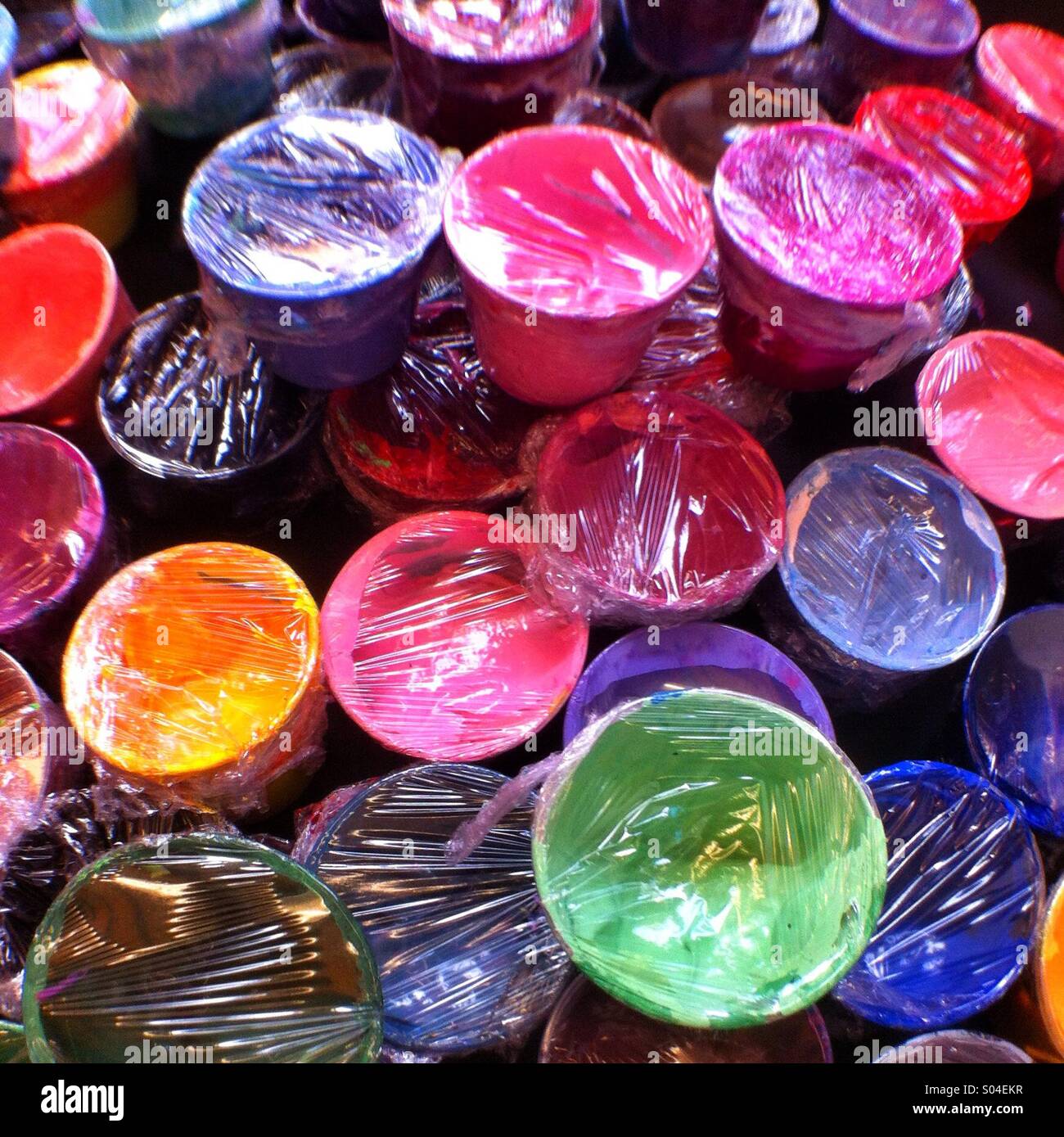 Pots of coloured ink used for screen printing. - Smartphone Captured Stock Image