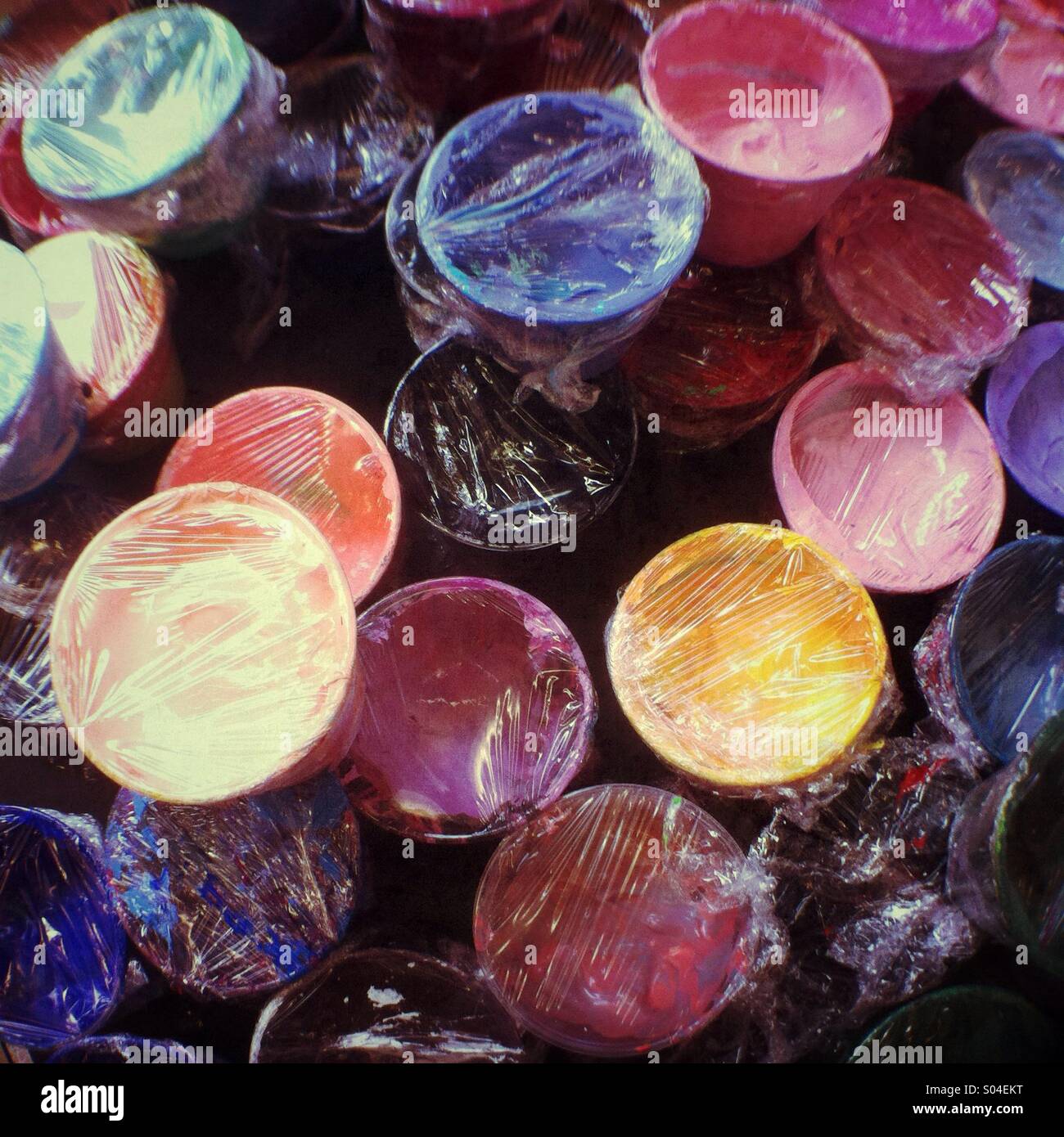 Pots of coloured ink used for screen printing. - Smartphone Captured Stock Image