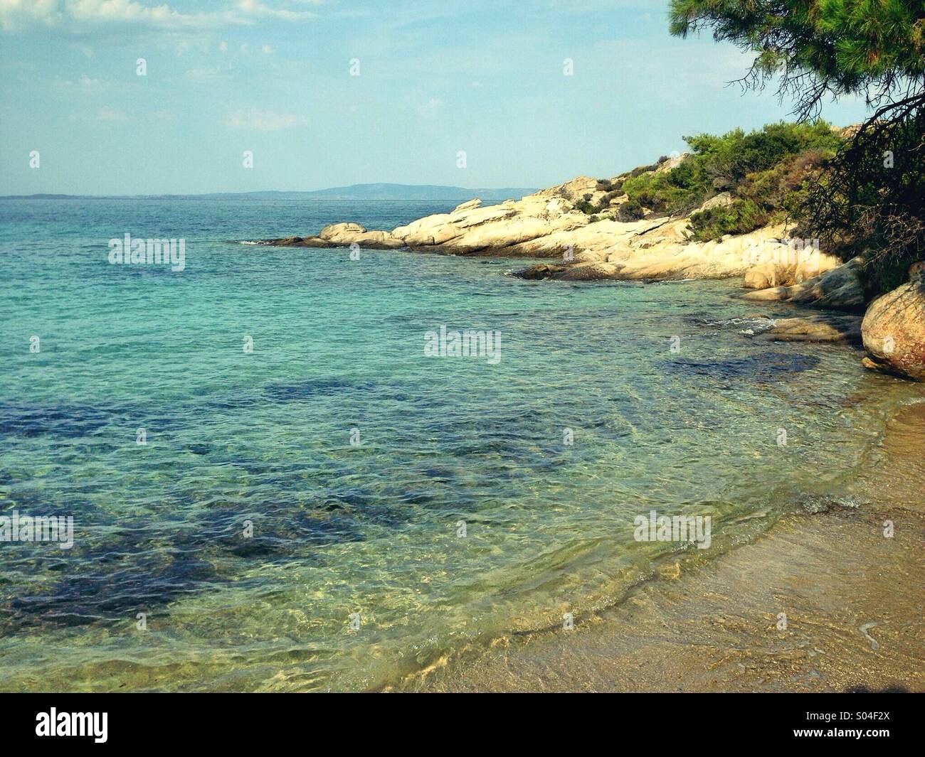 Greek turquoise water, Chalkidiki, Greece - Smartphone Captured Stock Image