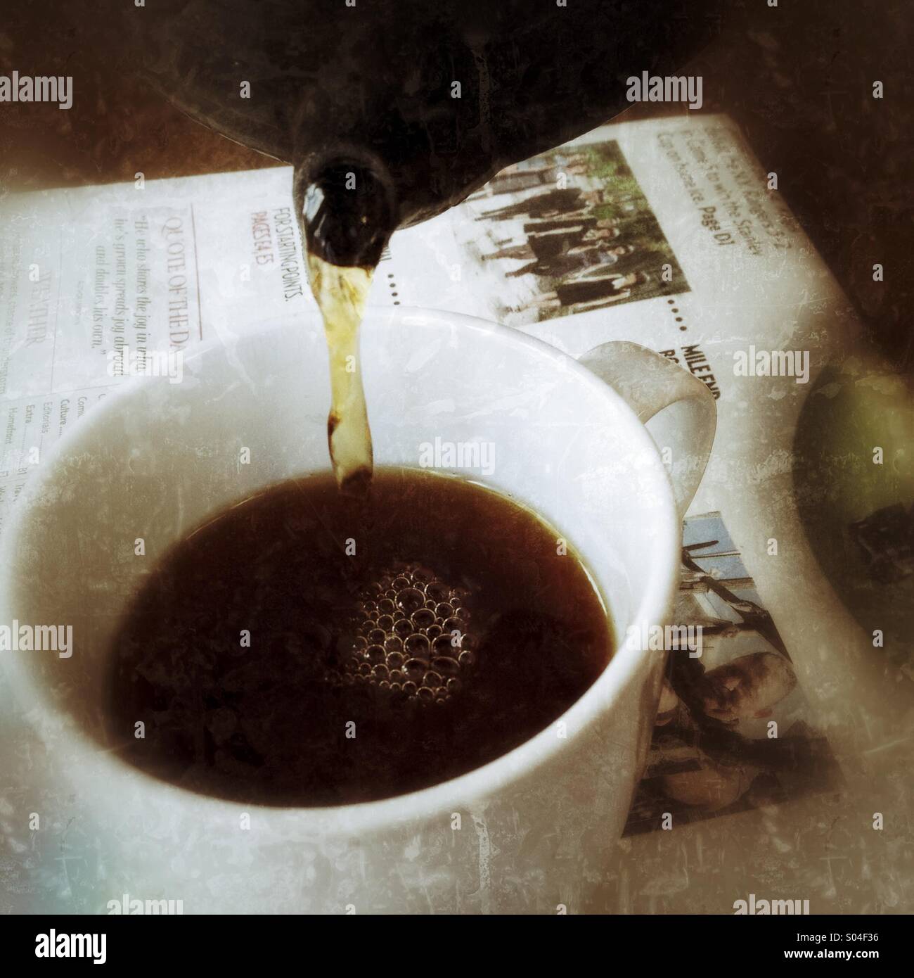 Hot beverage and newspaper - Smartphone Captured Stock Image
