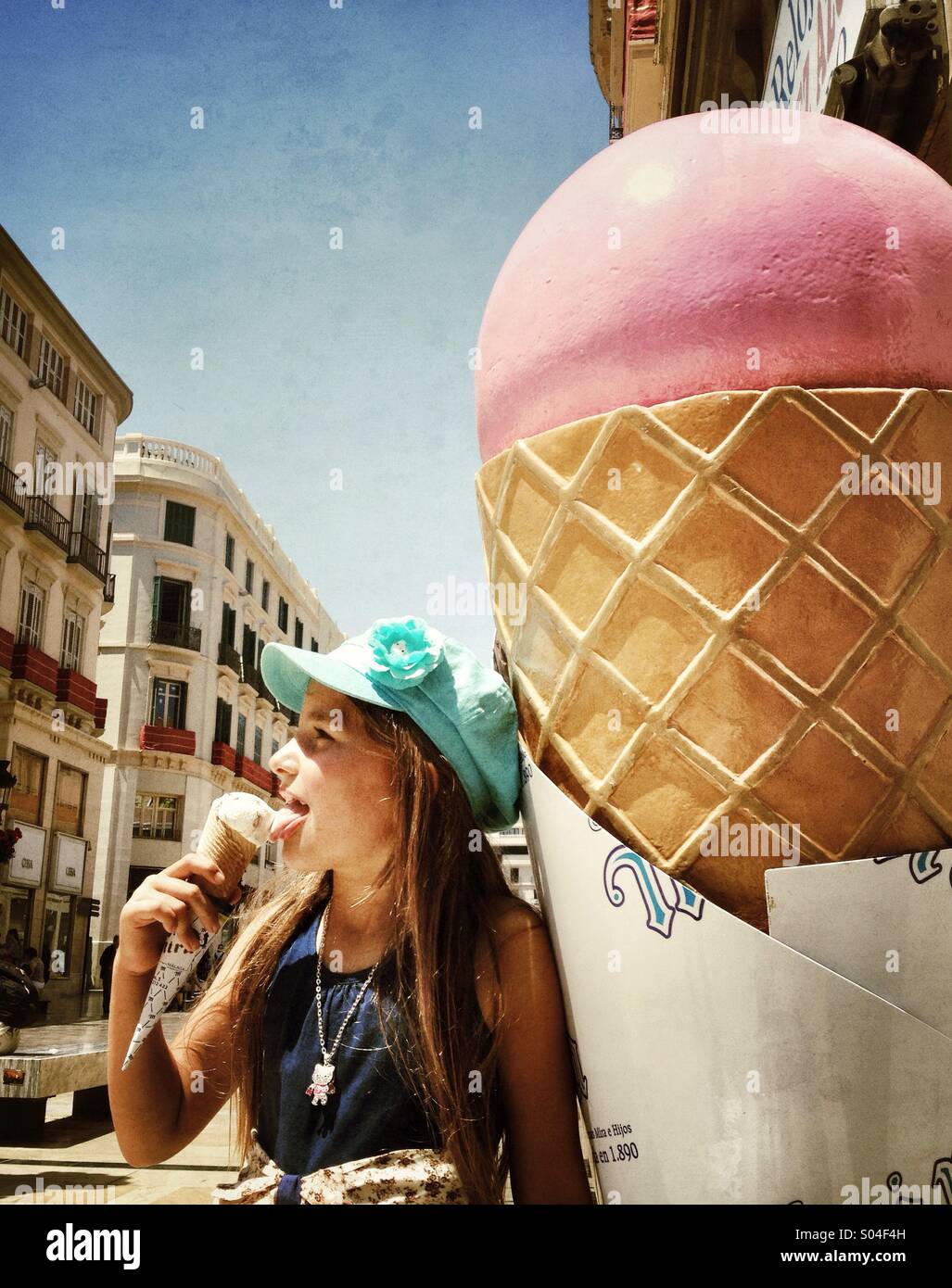 Young girl eating icecream. Stock Photo