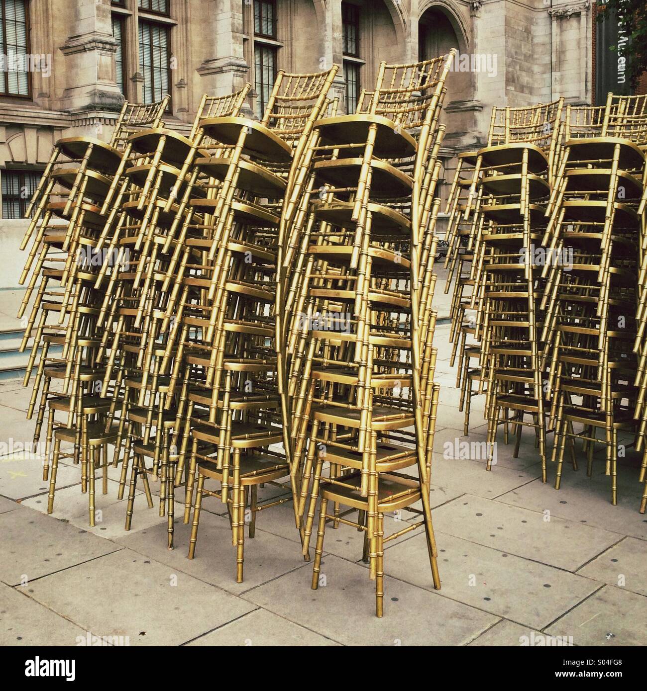 Stacked golden chairs - Smartphone Captured Stock Image