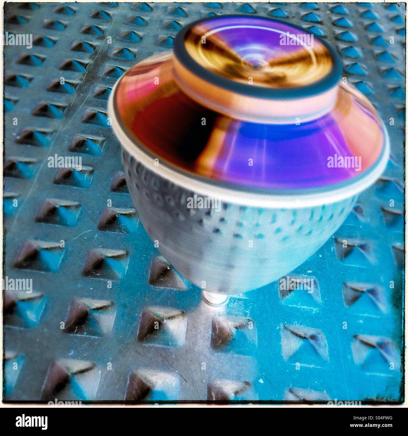 Colorful whirligig. Spinning top turning. - Smartphone Captured Stock Image