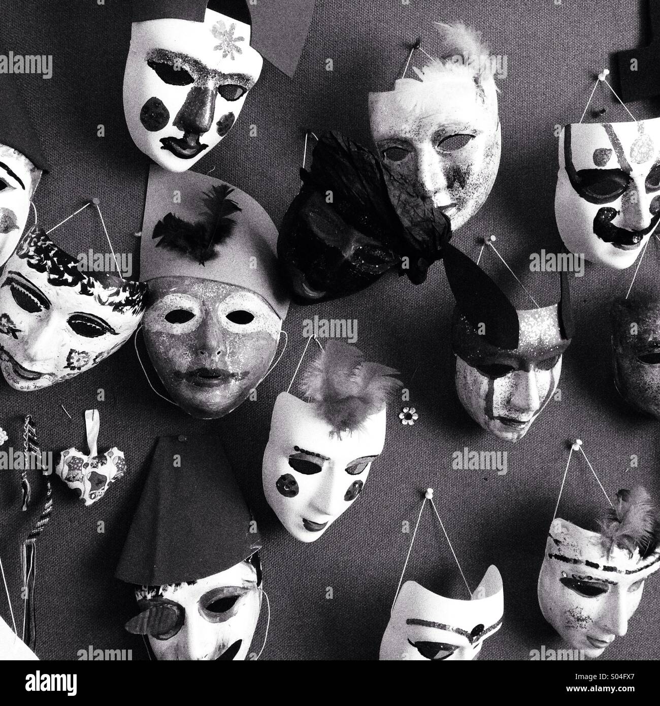 Masks hanging on a wall Stock Photo Alamy