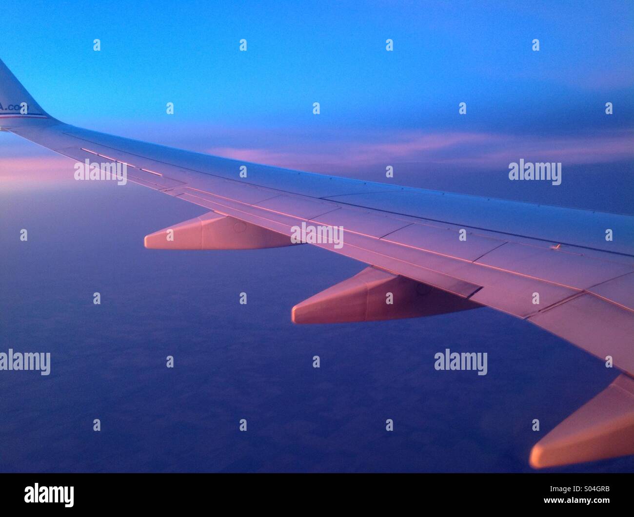 Airplane wing sunset hi-res stock photography and images - Alamy