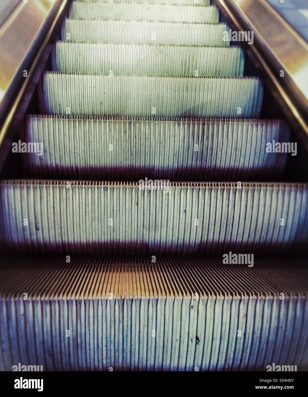 Mechanical stairs. Close up of escalator steps - Smartphone Captured Stock Image