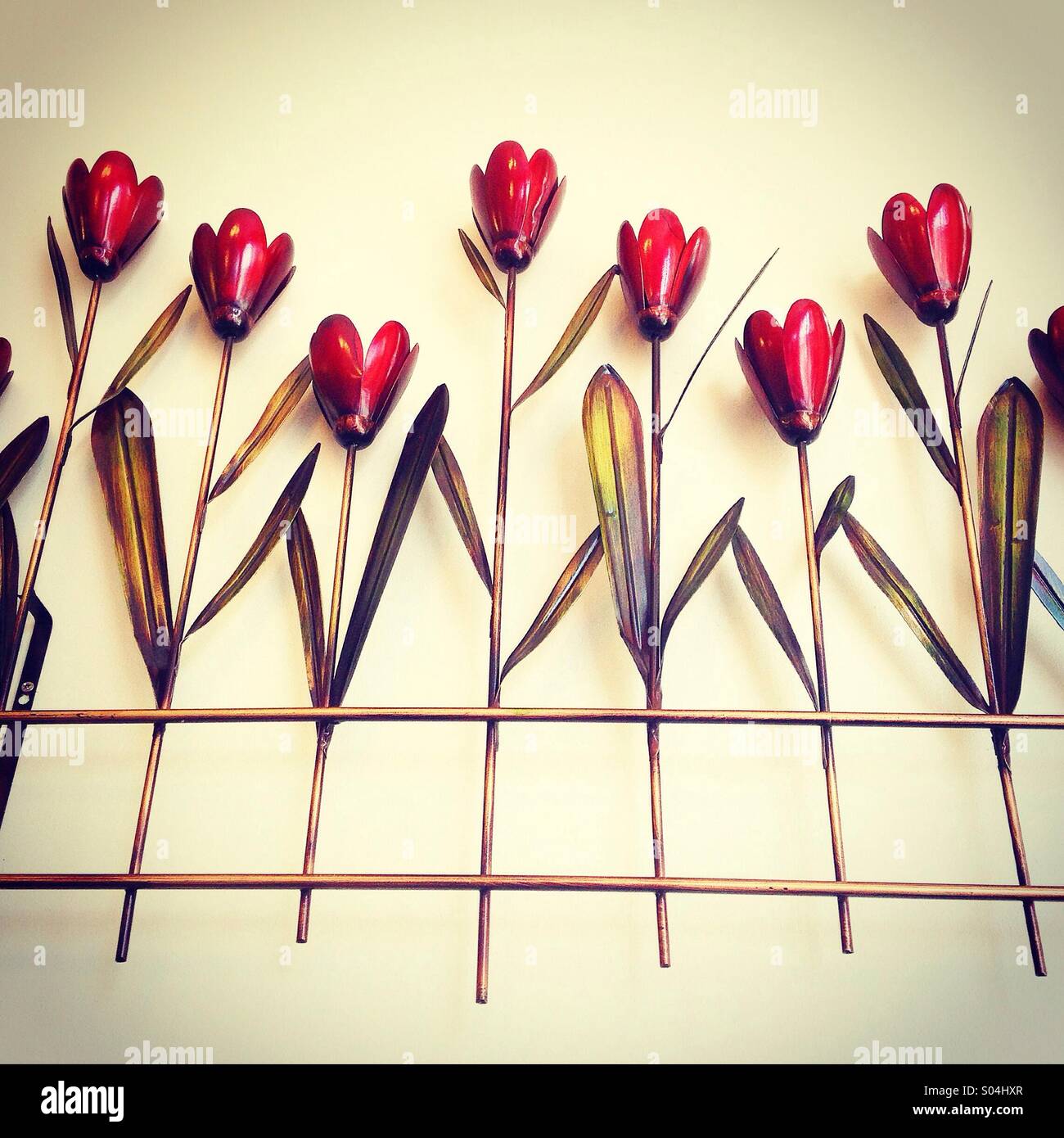 A metal wall hanging in a tulip design Stock Photo Alamy