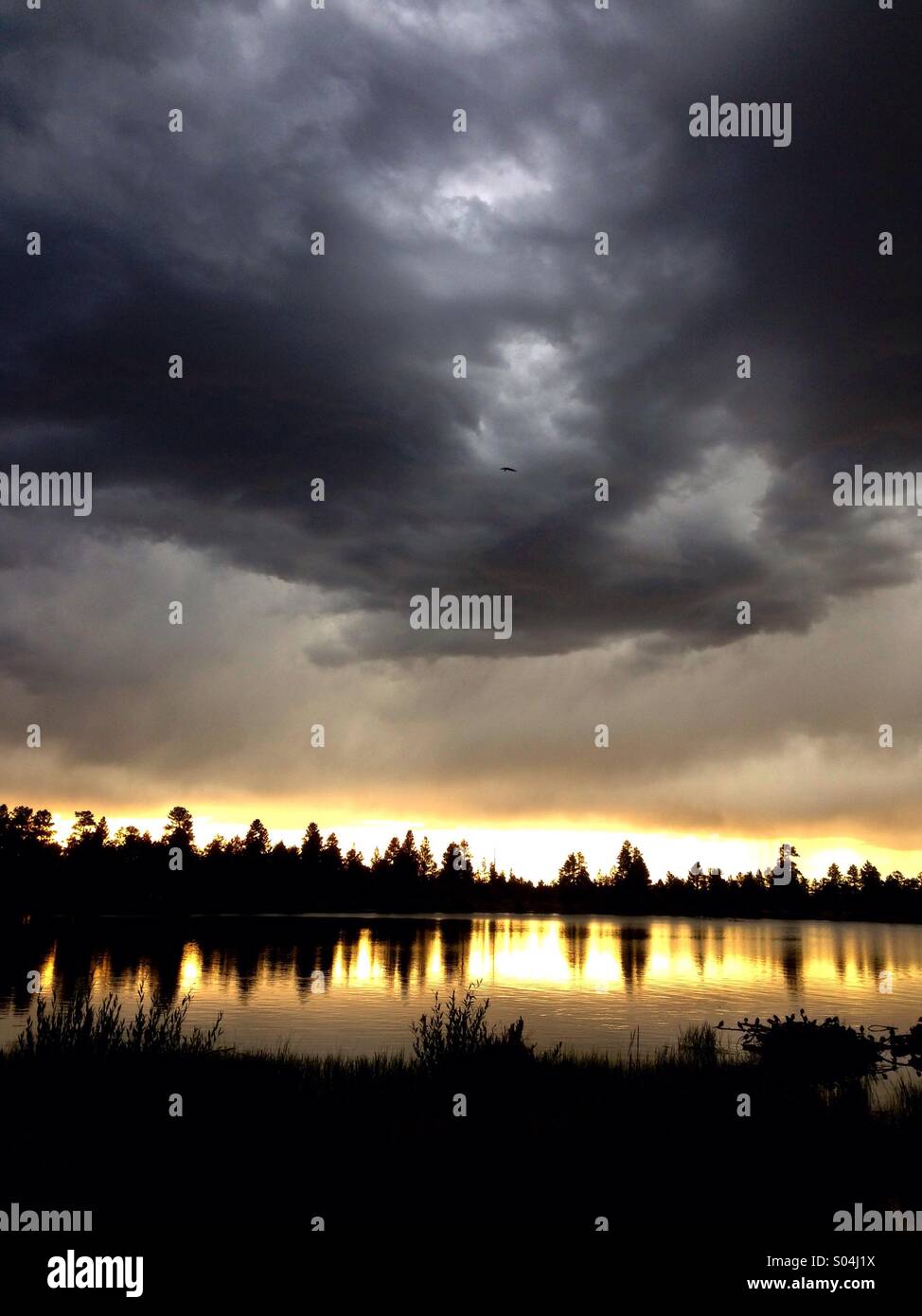 Lake with clouds at sunset Stock Photo - Alamy