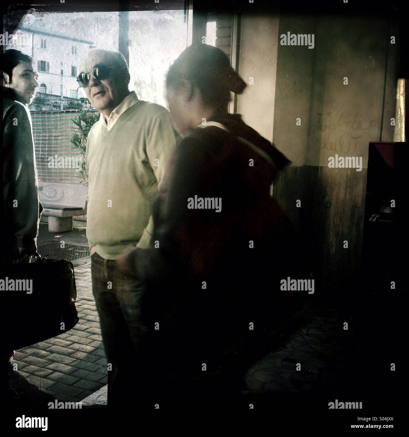 People in a little train station - Smartphone Captured Stock Image