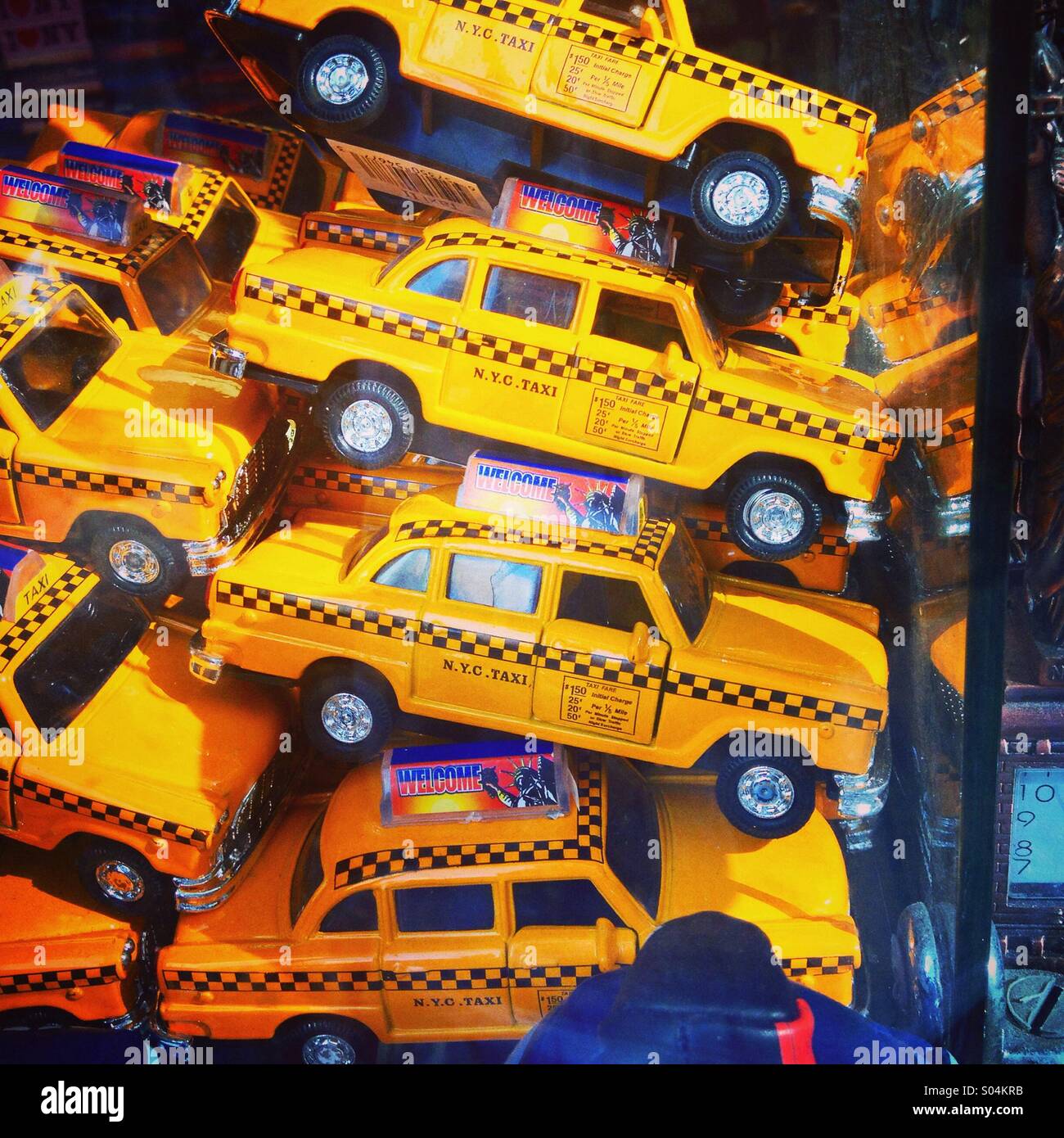 Toy cars modelled on New York city yellow taxis Stock Photo