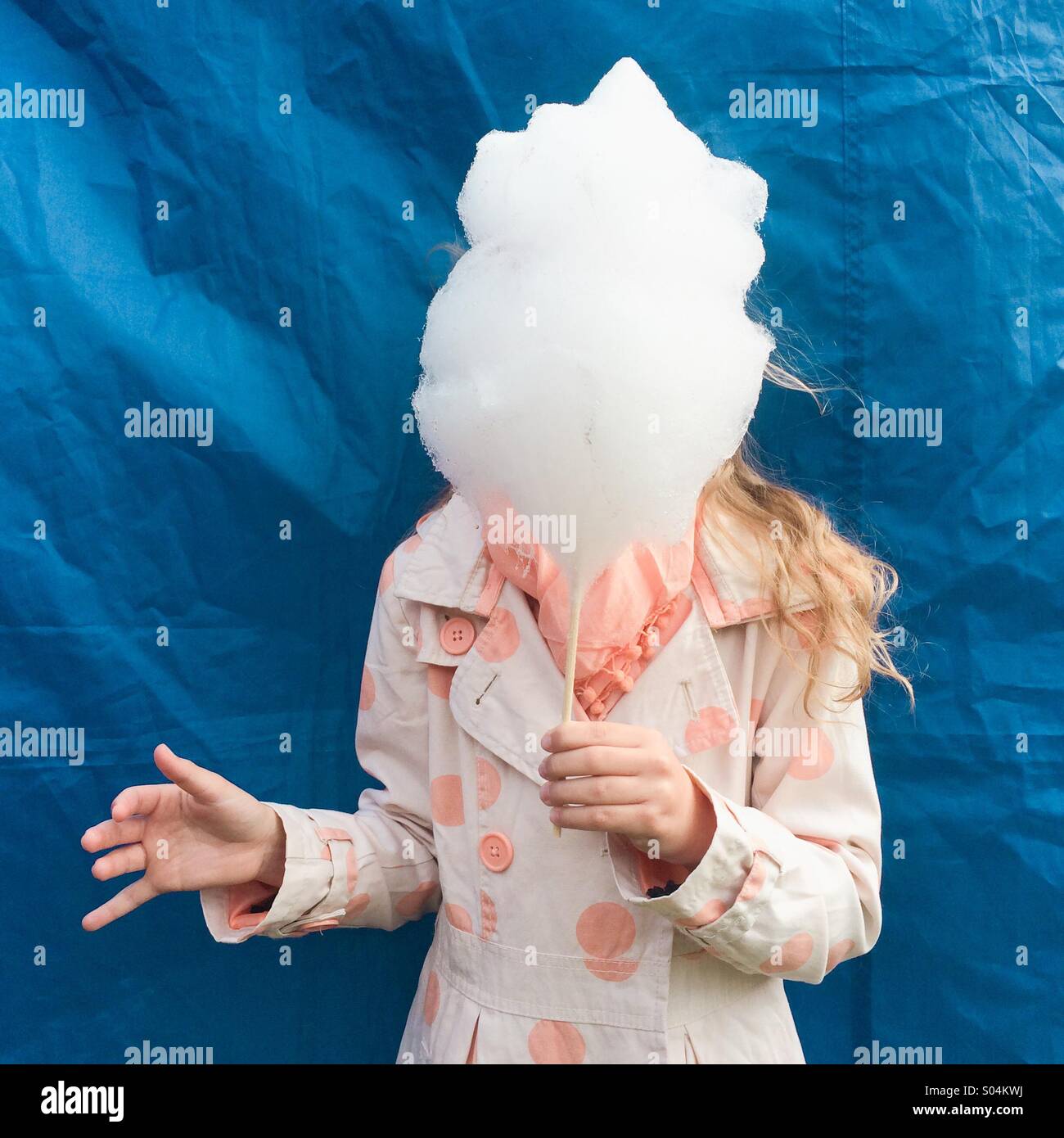 Girl with candyfloss Stock Photo