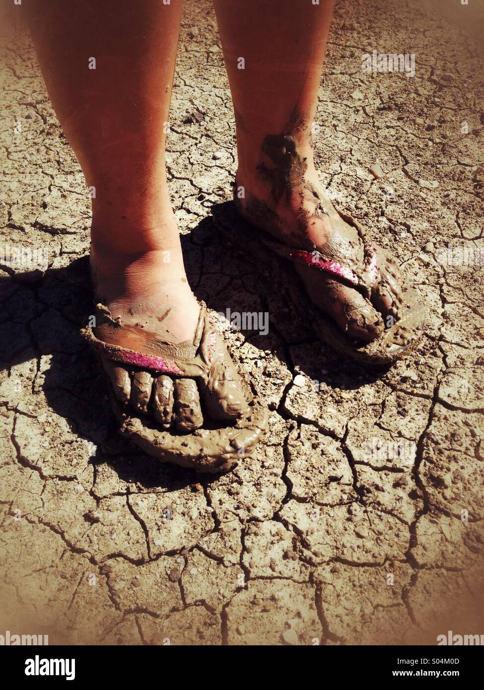 Muddy feet in flip flops hi-res stock photography and images - Alamy