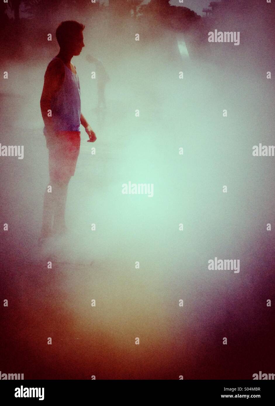 Teenager staring into a fog - Smartphone Captured Stock Image