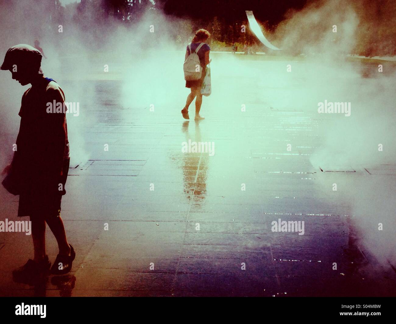 Two girls in the mist - Smartphone Captured Stock Image