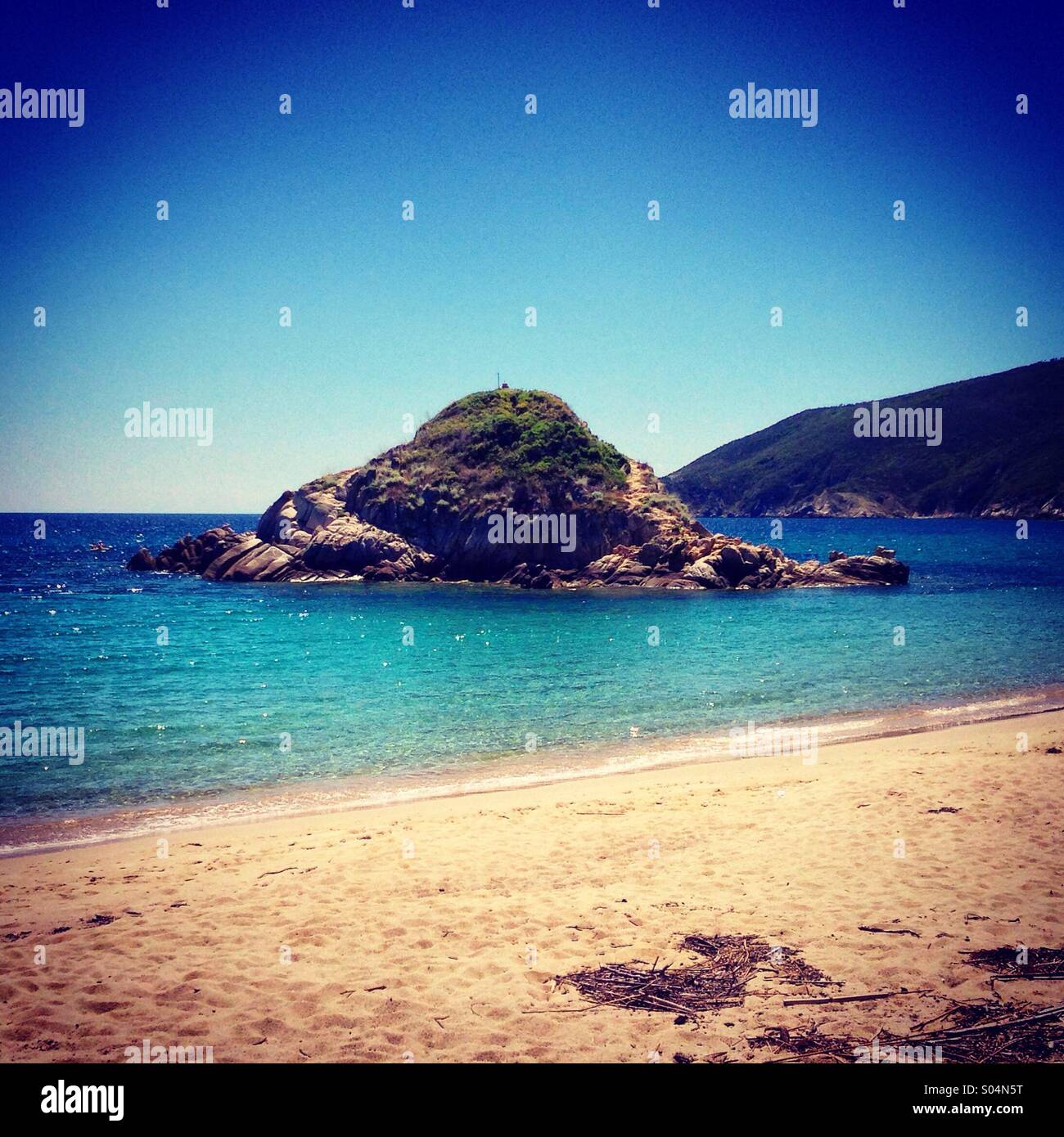 Little island close to shore Stock Photo Alamy