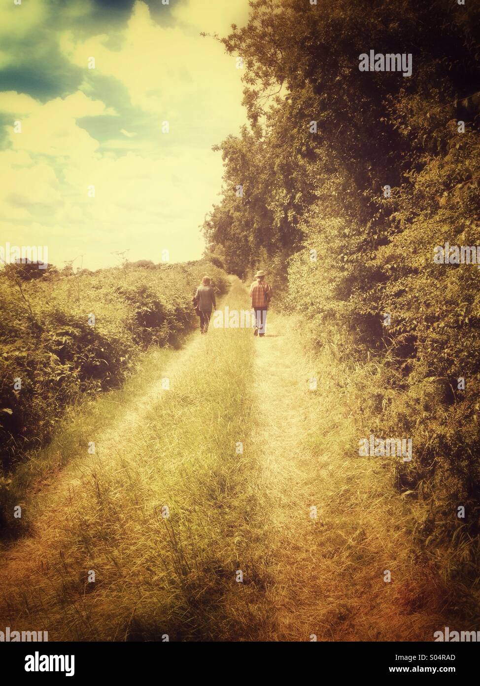 Two people on a country walk in England, UK - Smartphone Captured Stock Image