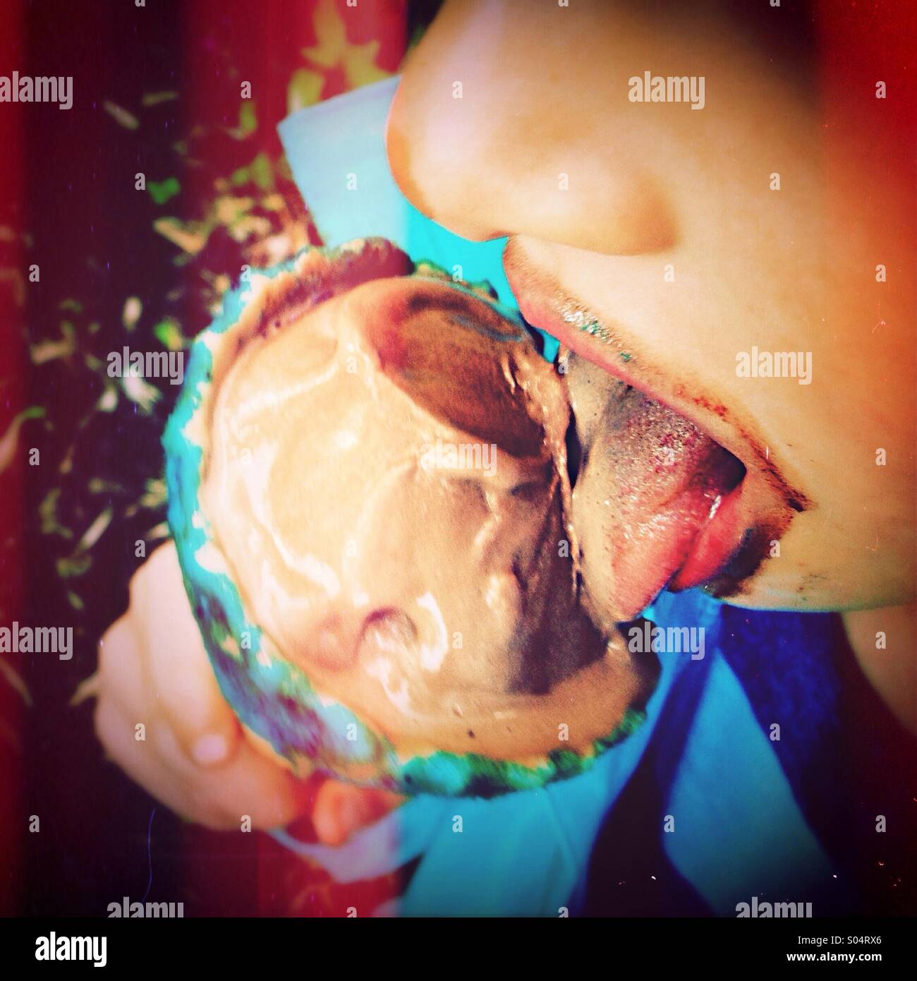 Girl licking chocolate ice cream with retro feel - Smartphone Captured Stock Image