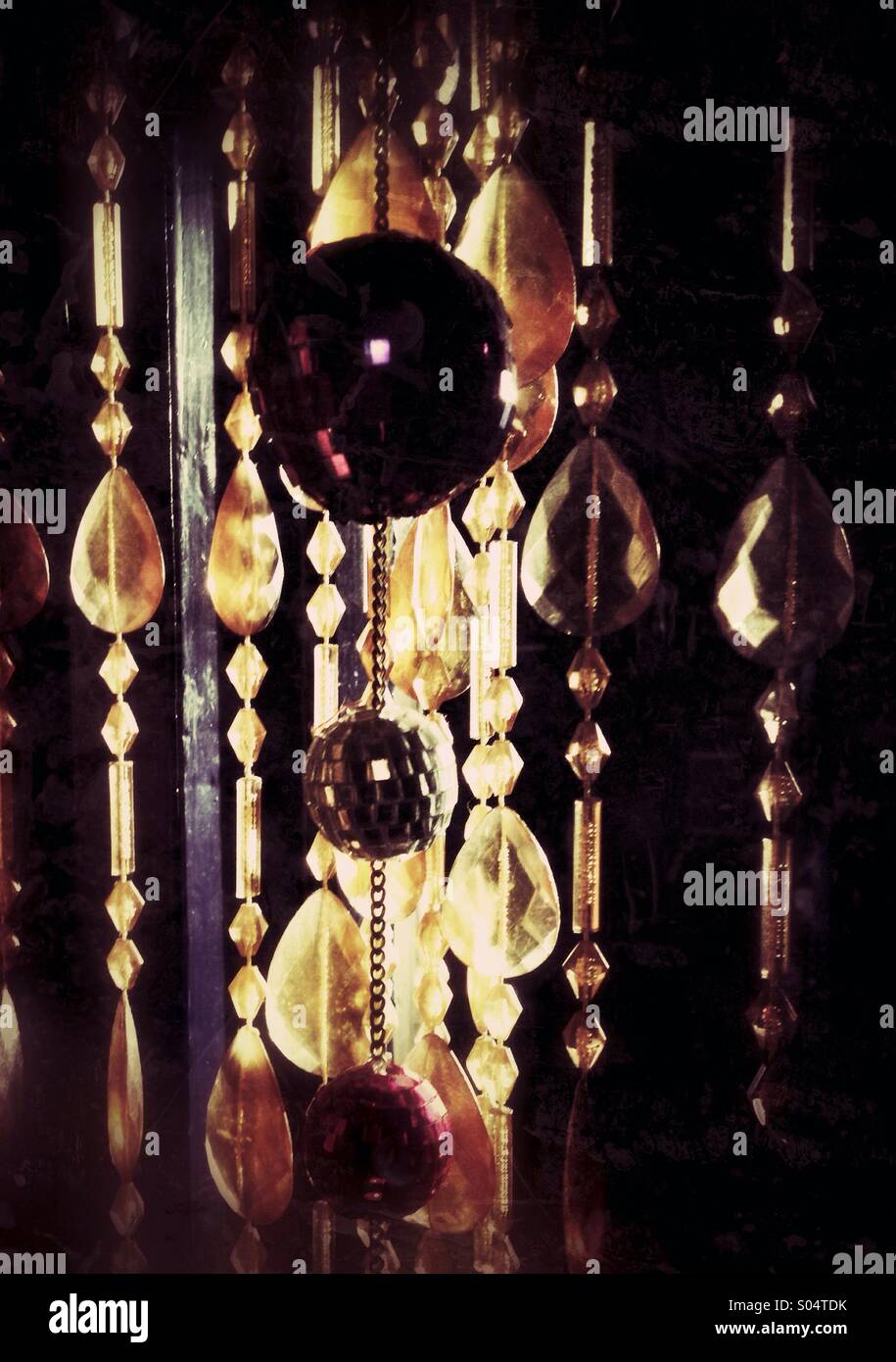 Glitter balls and crystal bead curtain in the light - Smartphone Captured Stock Image