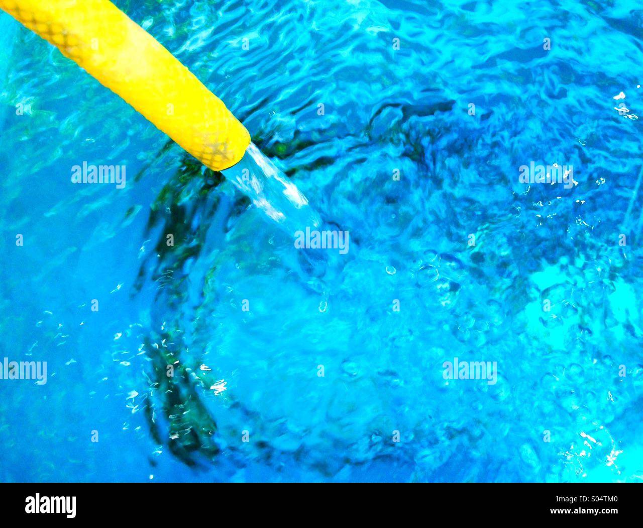 Bucket of water filling hires stock photography and images Alamy