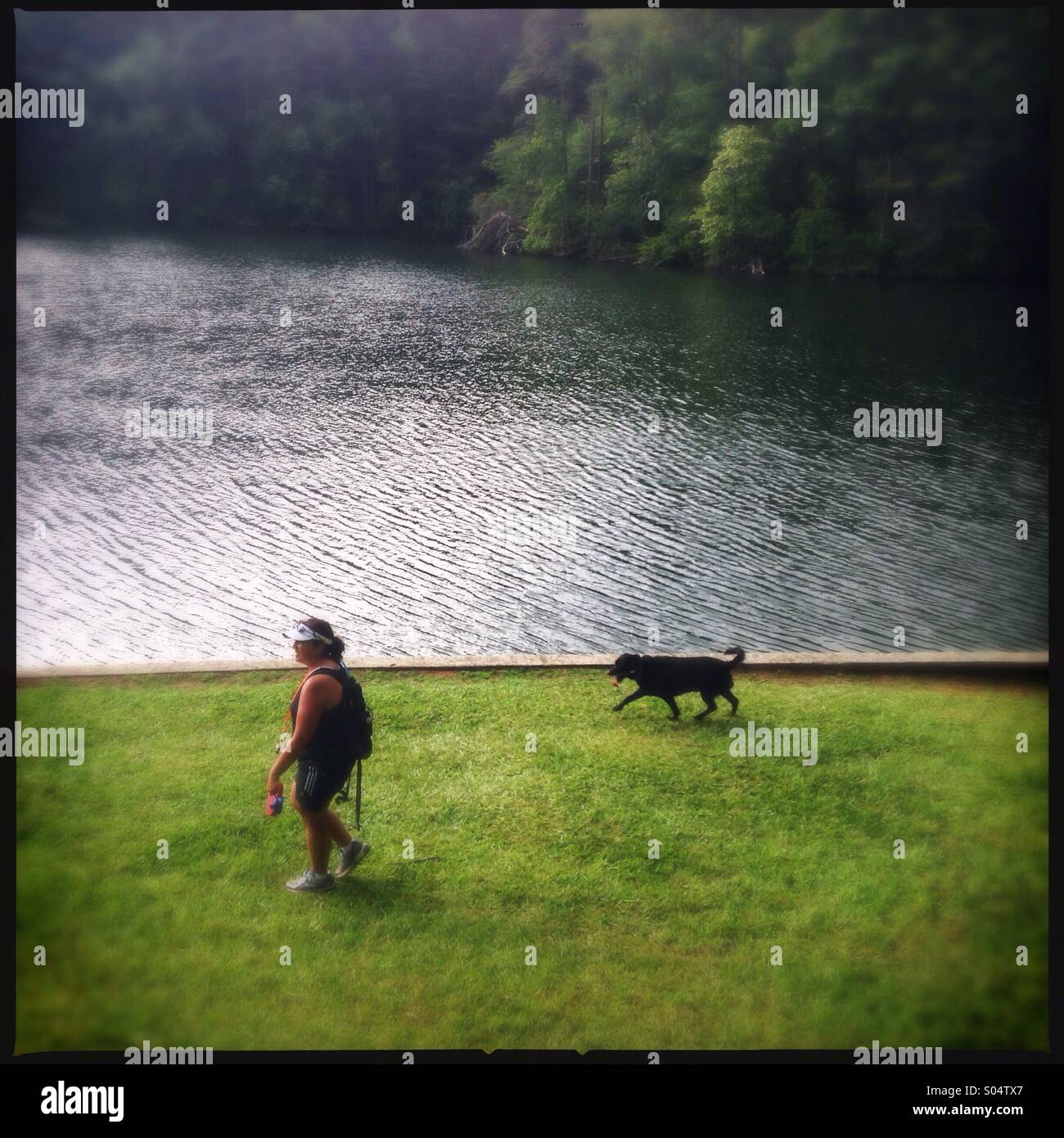 Woman walking her dog in Tallulah gorge state park in Georgia, USA Stock Photo