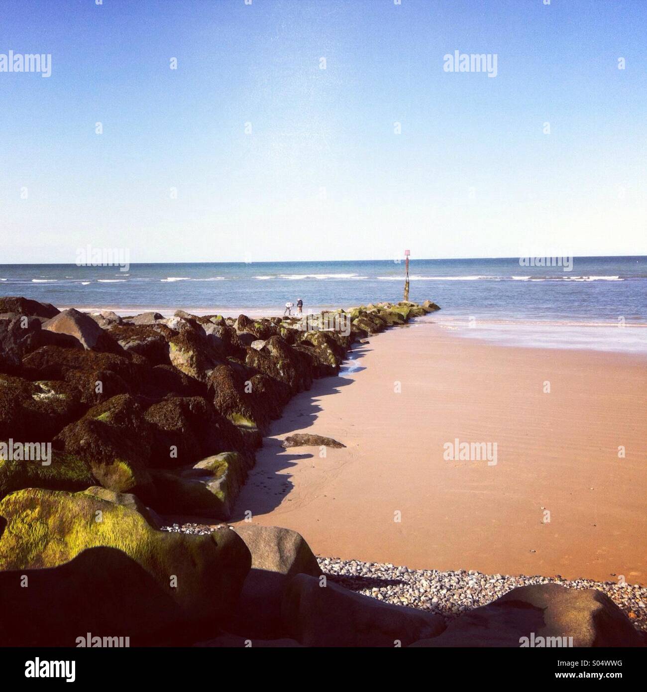 Stones on Sherringham beach Stock Photo - Alamy