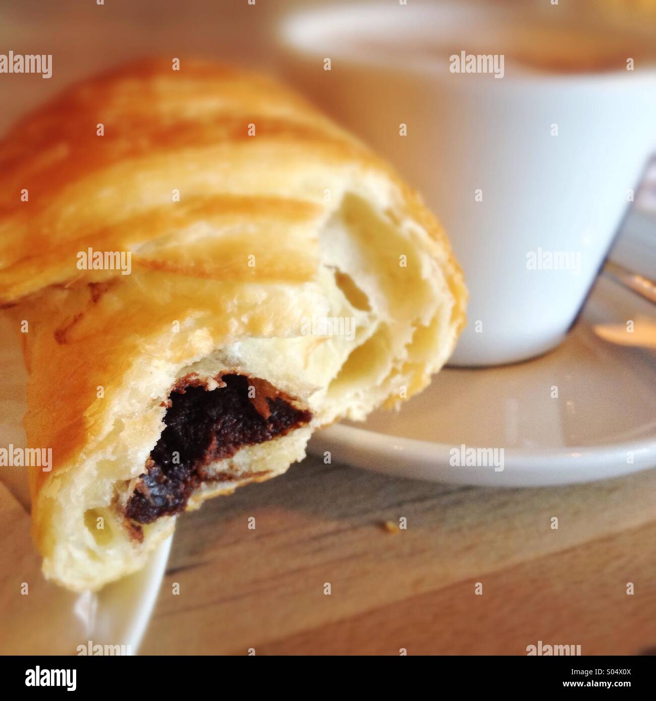 Chocolate croissant and coffee Stock Photo Alamy