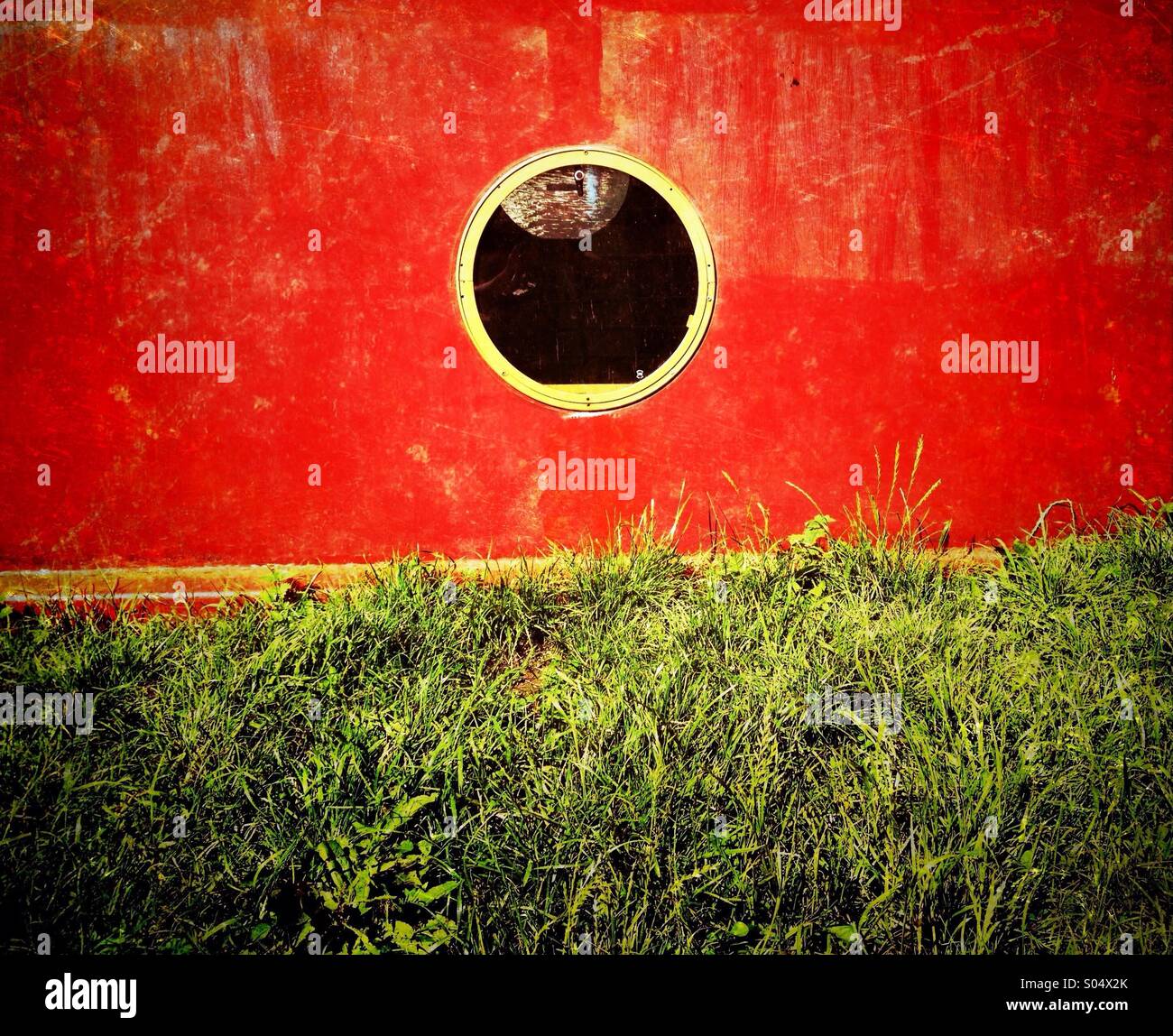 Porthole on moored narrow boat - Smartphone Captured Stock Image