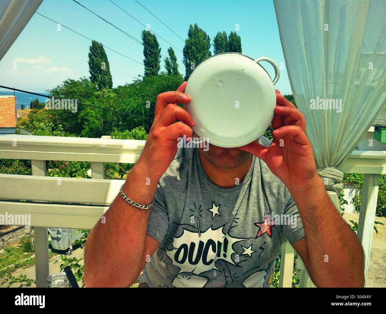 One person eating from pan - Smartphone Captured Stock Image