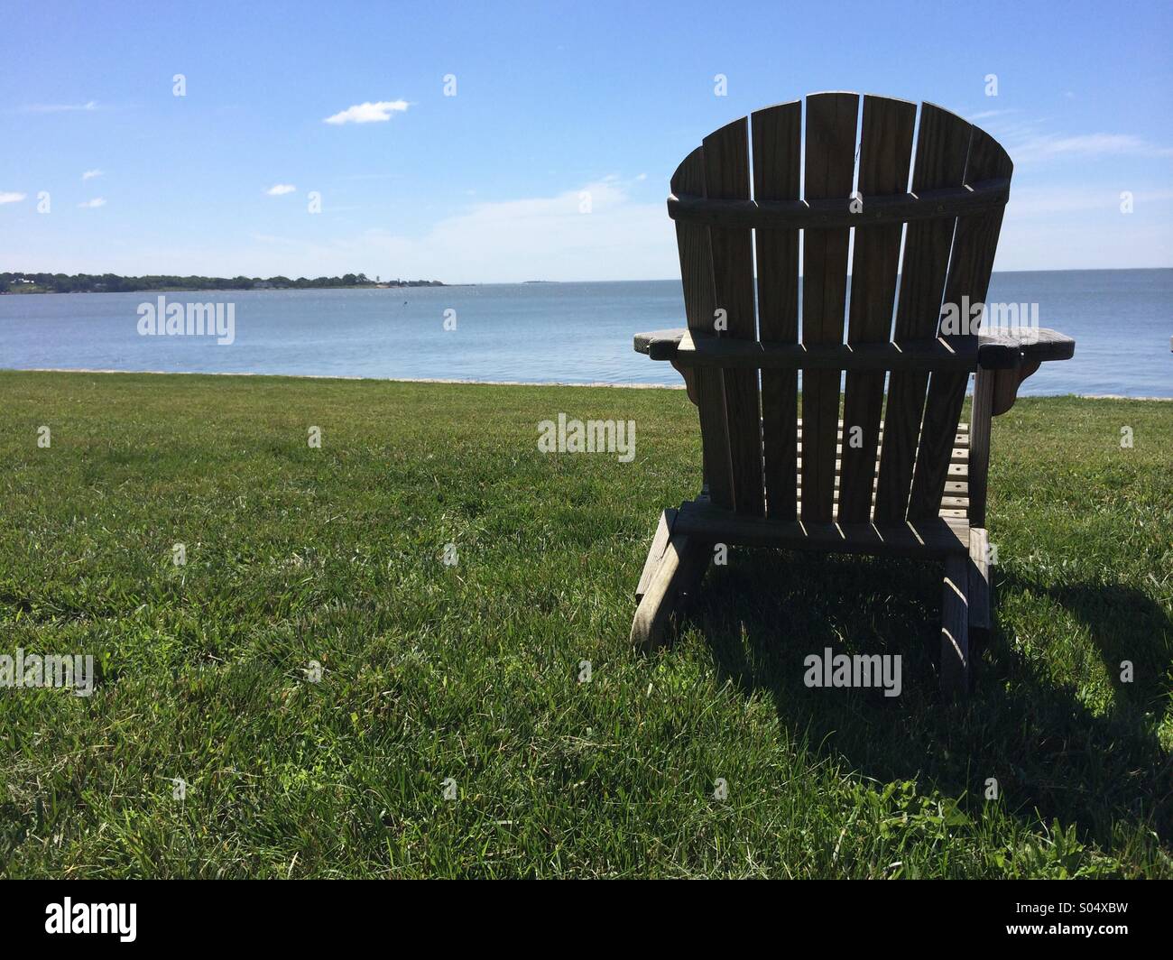 Empty Adirondack Chair Stock Photo