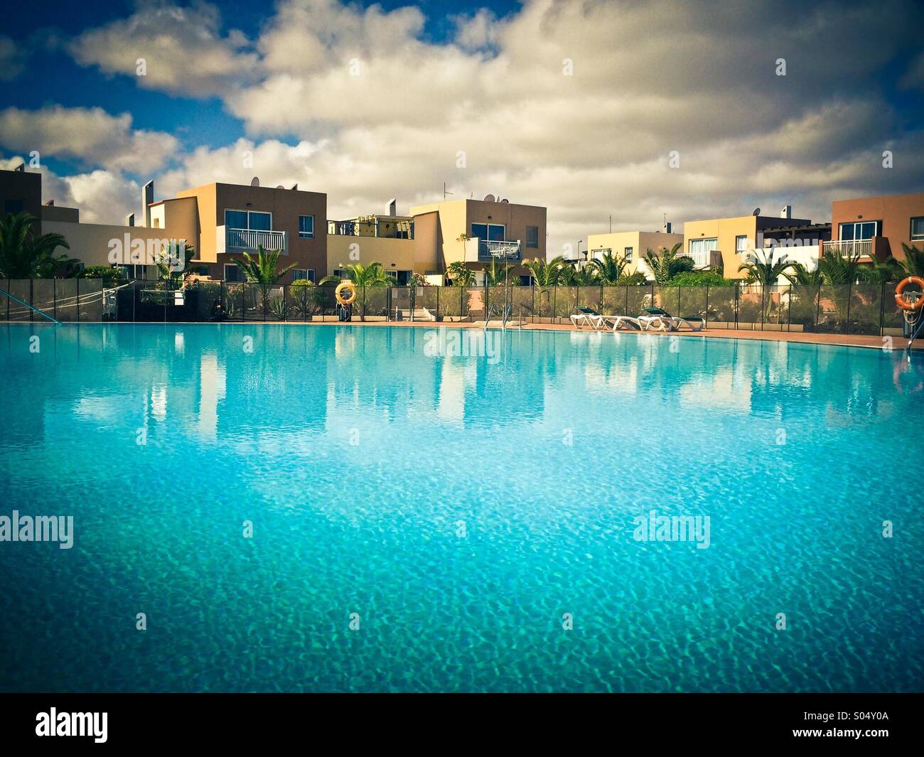 Image showcasing Swimming pool at apartment complex Stock Photo - Alamy