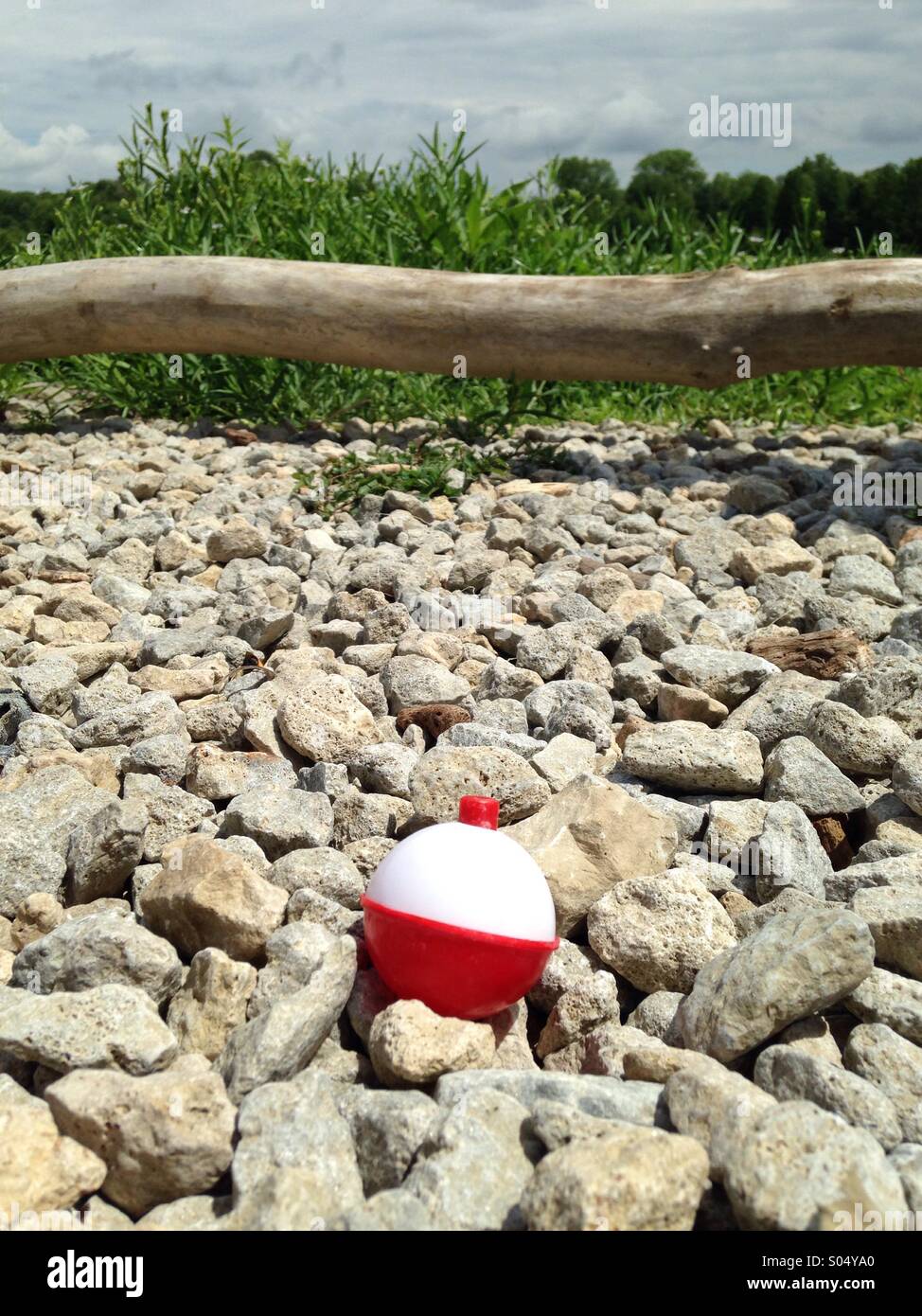 A fishing bobber left behind. - Smartphone Captured Stock Image