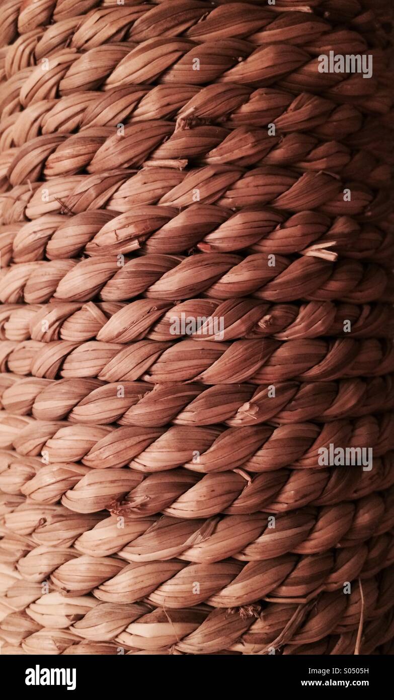 Rope wrapped post background Stock Photo - Alamy