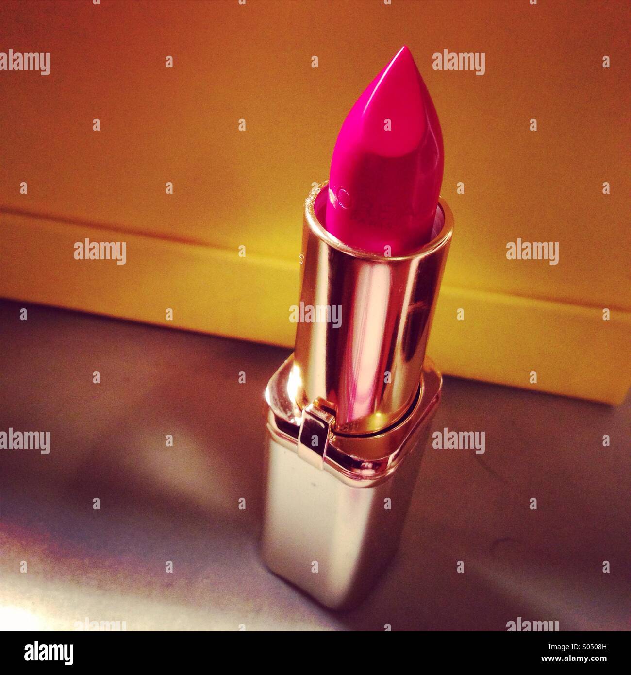 Gold lipstick hi-res stock photography and images - Alamy
