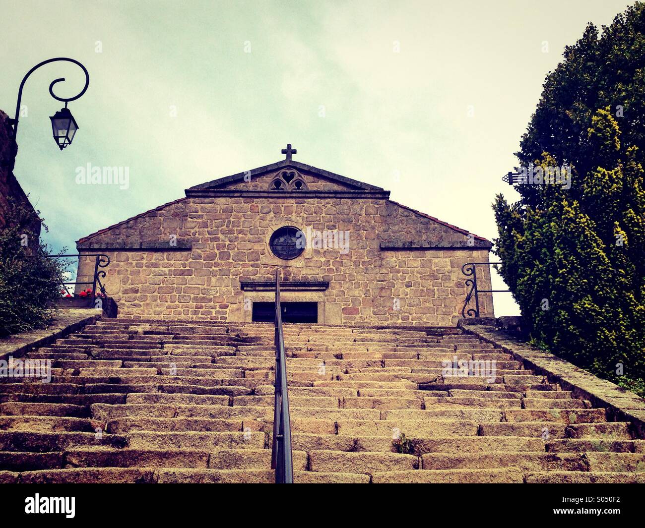 Staircase and church,Chambles,Loire,France - Smartphone Captured Stock Image