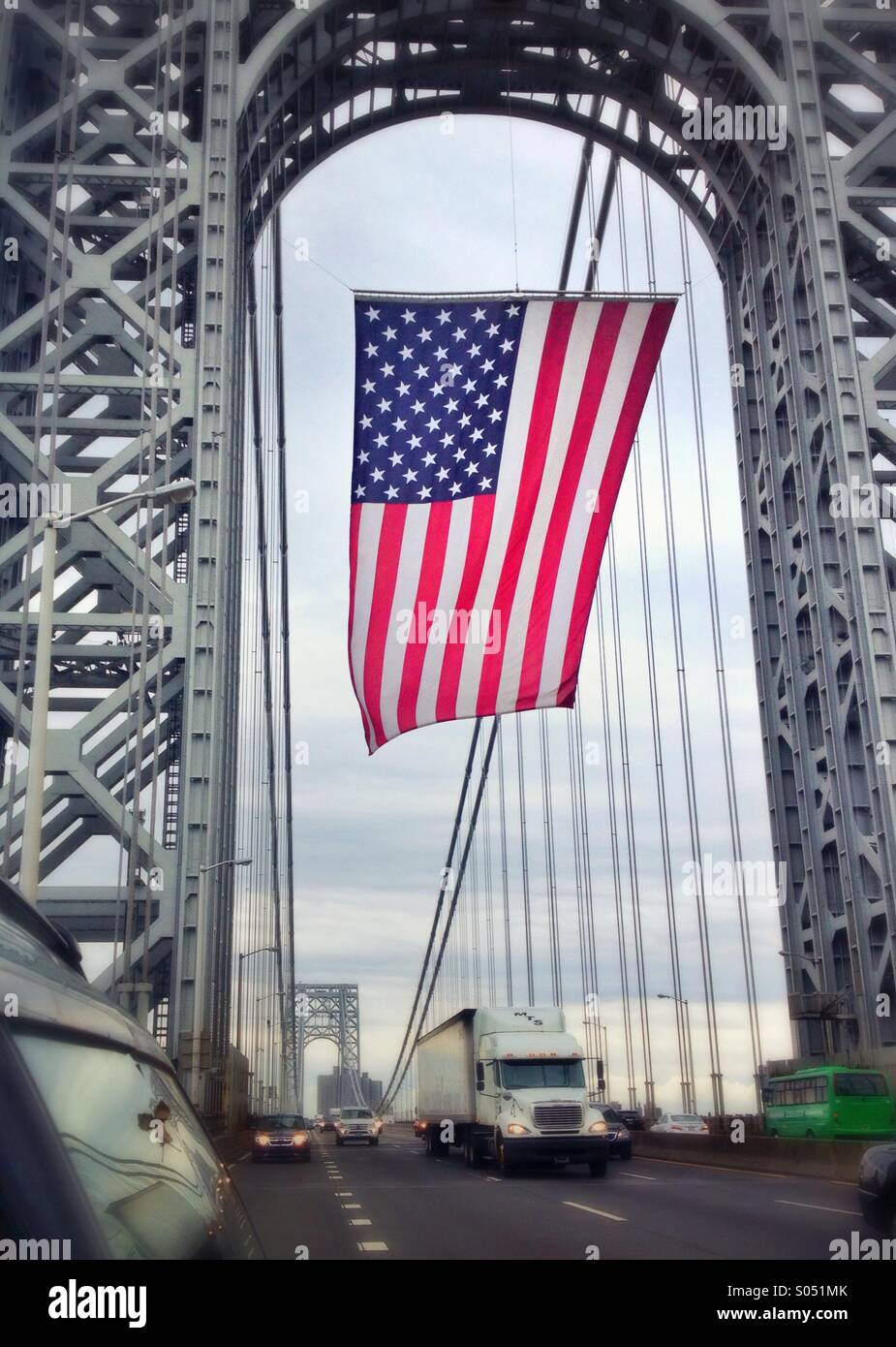Huge American flag hanging on George Washington Bridge on fourth of July 2014 - Smartphone Captured Stock Image