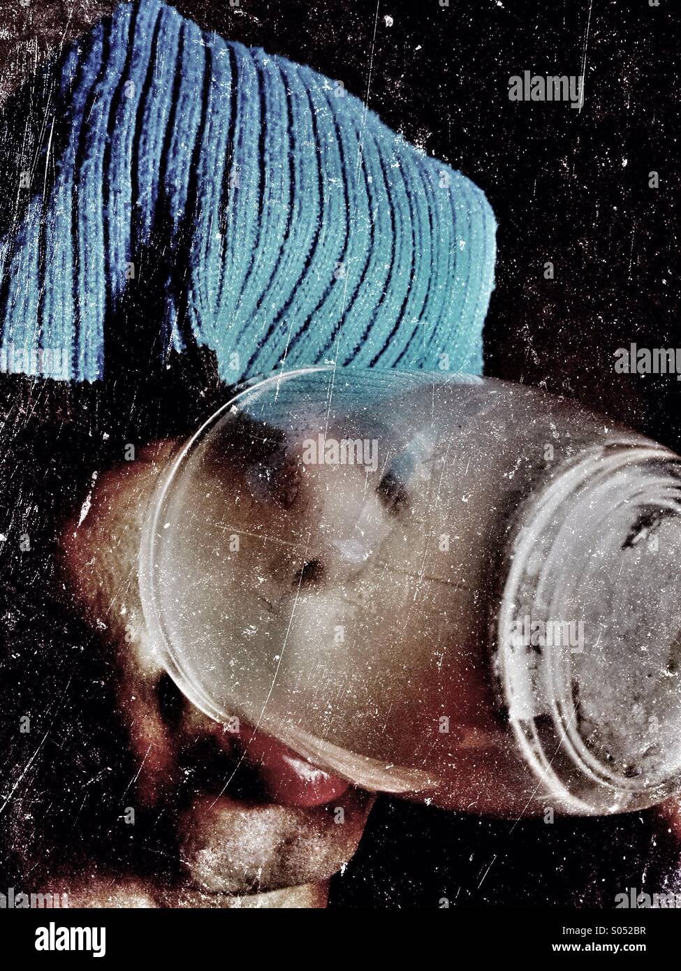 Man drinking in glass cup - Smartphone Captured Stock Image