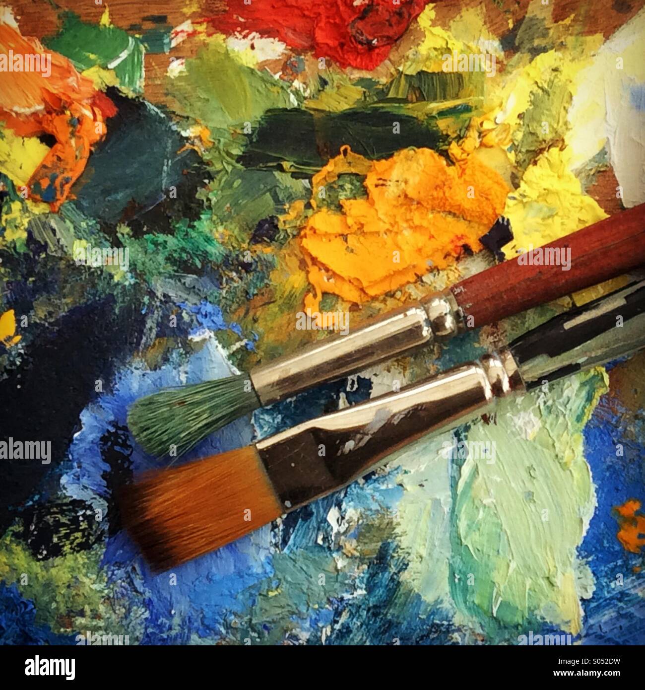 Close up art palette and brushes. Mobile phone photo with some phone or tablet post processing. - Smartphone Captured Stock Image