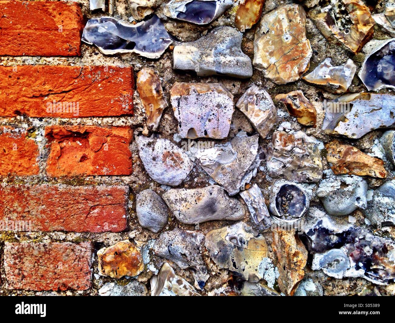 Flint wall with brick Stock Photo Alamy
