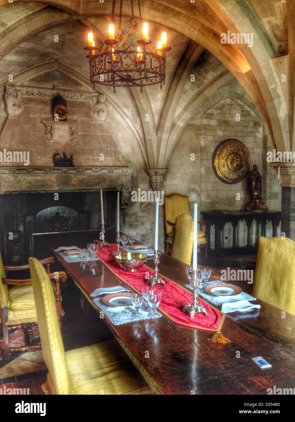 Tudor table by an open fire Stock Photo