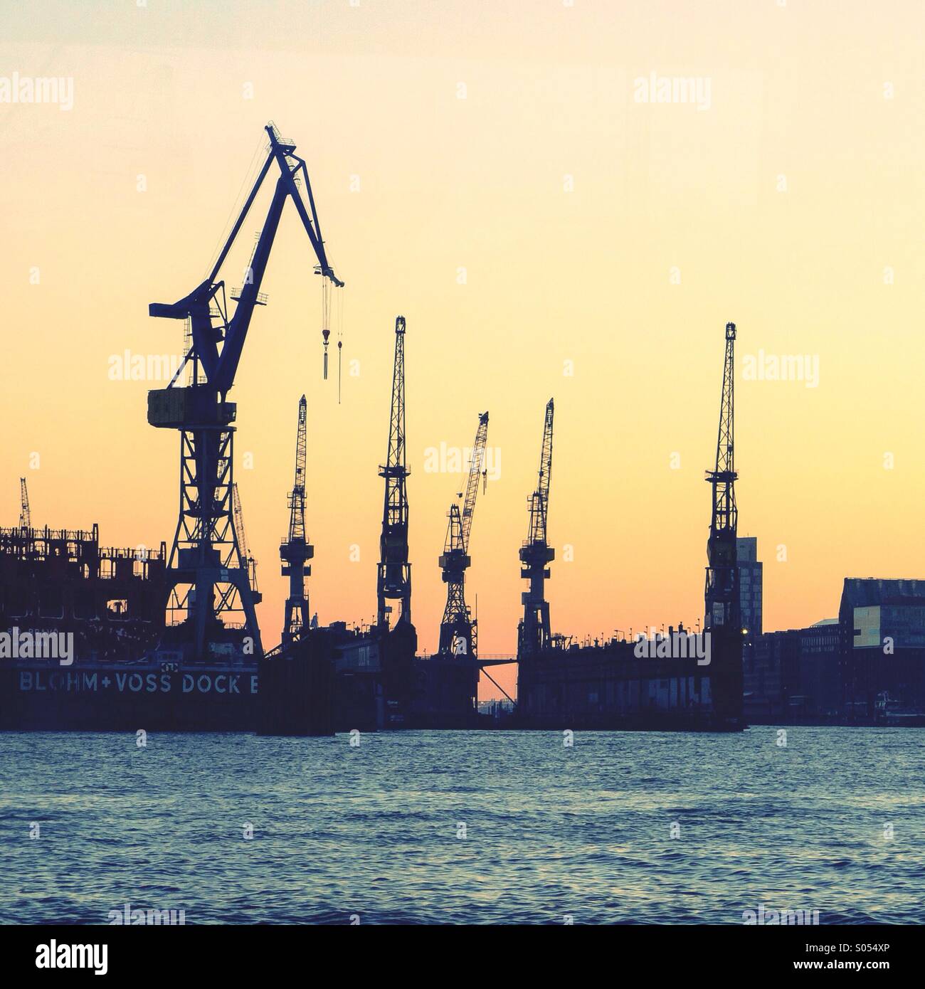 Harbor crane skyline in the port of Hamburg, Germany. - Smartphone Captured Stock Image