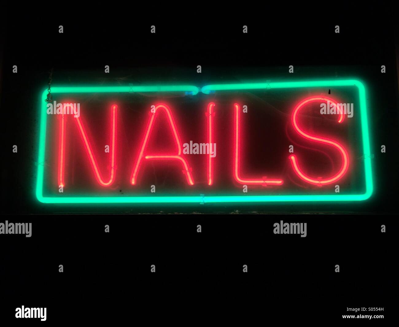 Neon nails sign Stock Photo Alamy