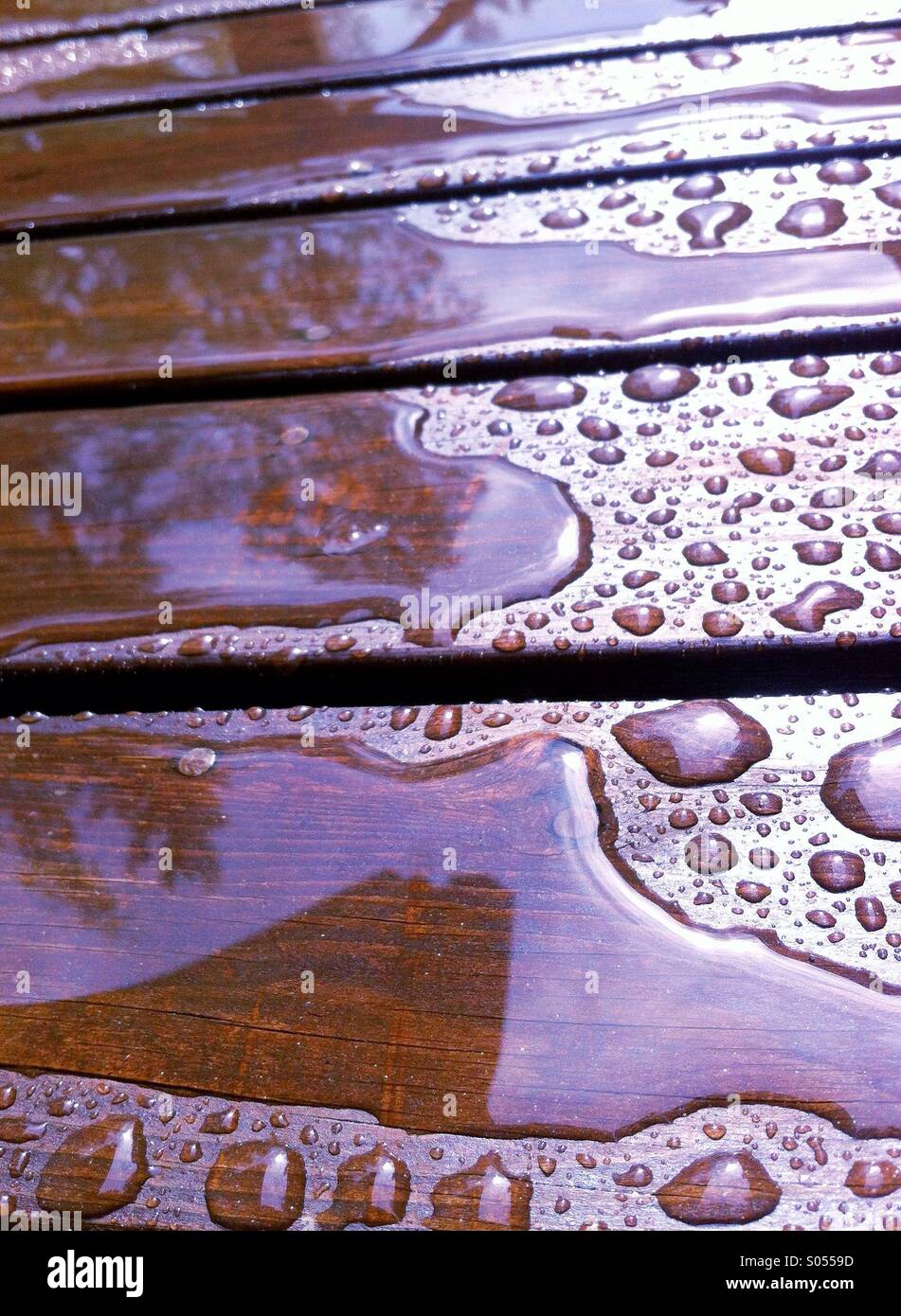 Rain water on wooden terace Stock Photo