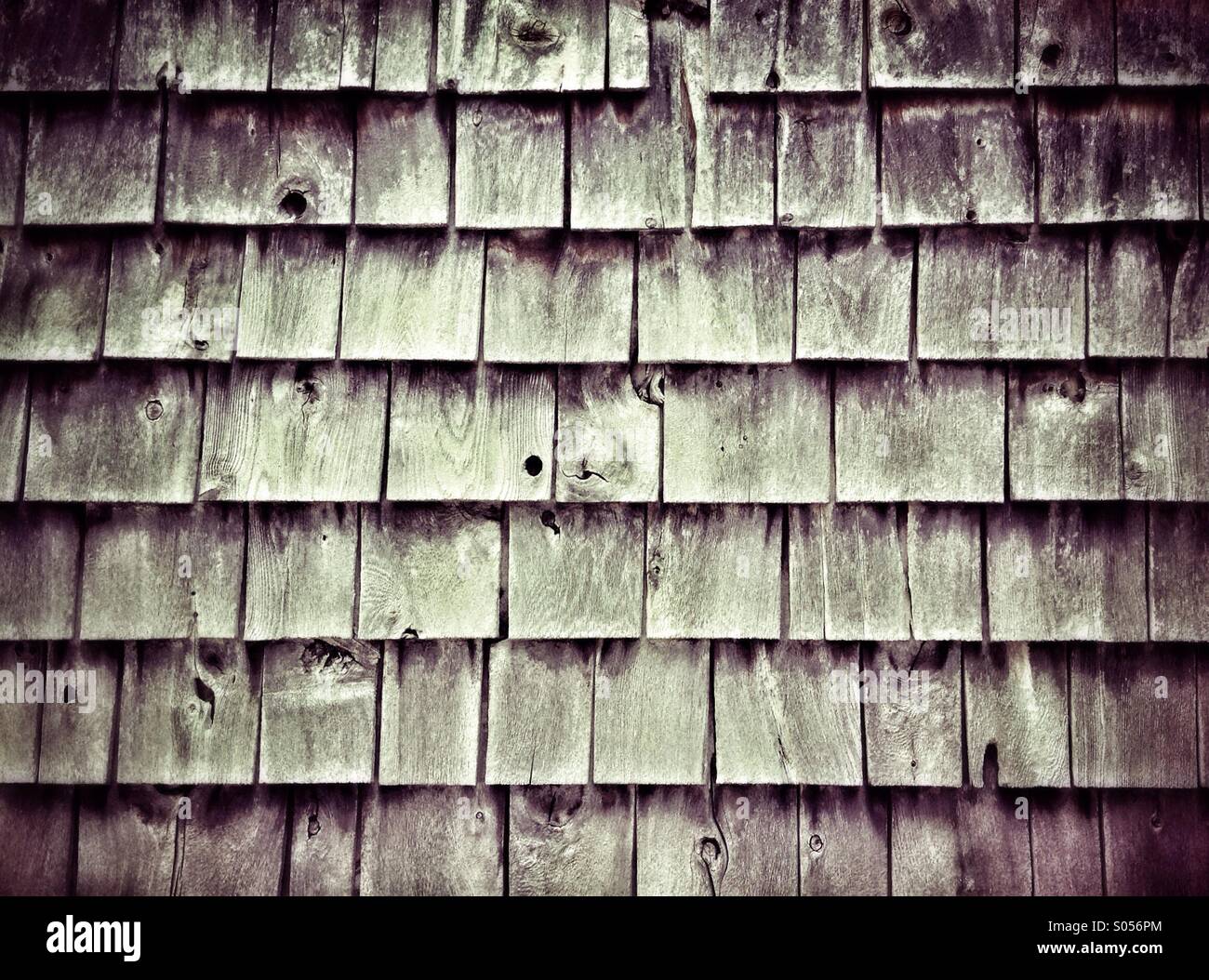 Weathered wood shingle siding Stock Photo