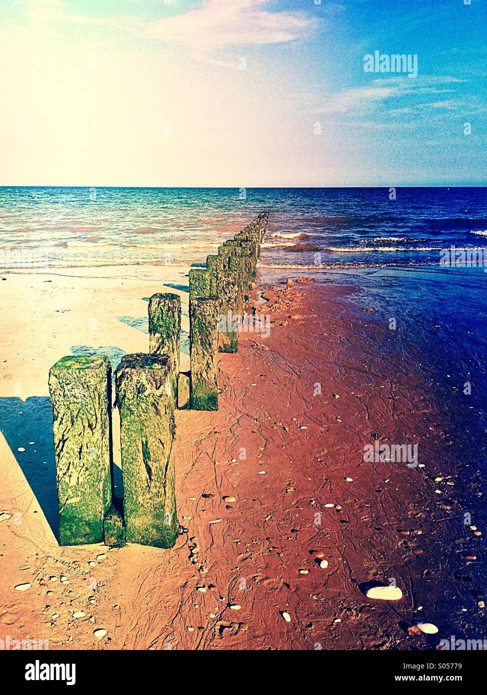 Groynes going into the sea - Smartphone Captured Stock Image