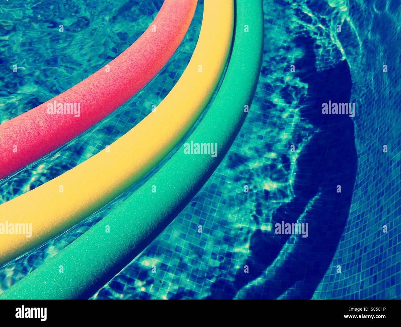 Abstract of foam floats in a swimming pool Stock Photo - Alamy