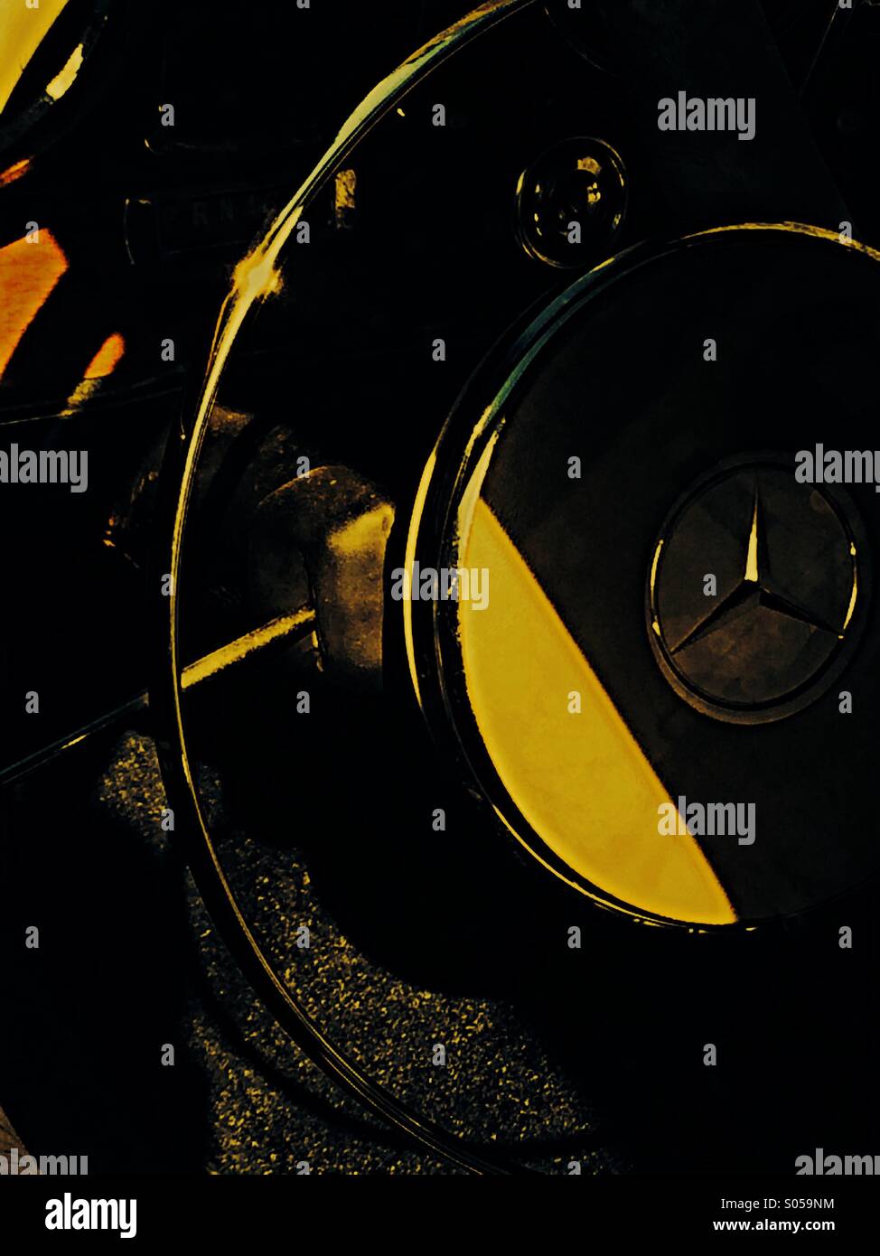 Sunlight on steering wheel of classic Mercedes car - Smartphone Captured Stock Image