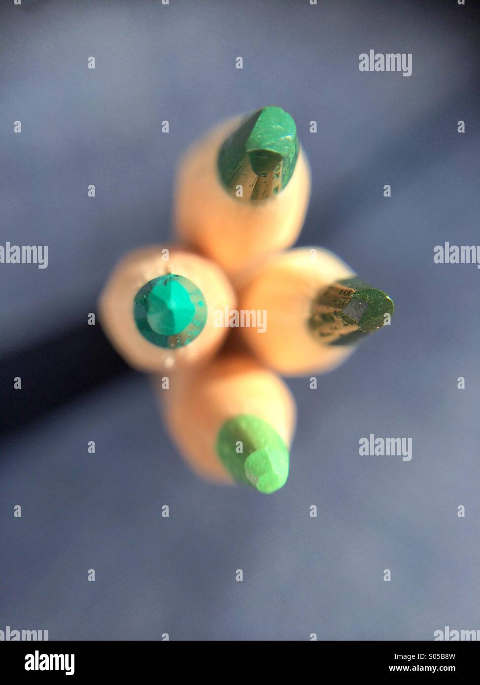 Green pencils pointing the camera - Smartphone Captured Stock Image